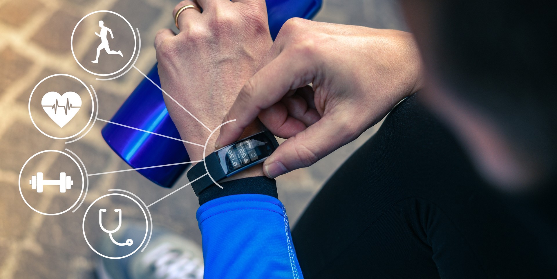 Man running in the park. Healthy runner with smart fit watch. Technology, training, health concept.